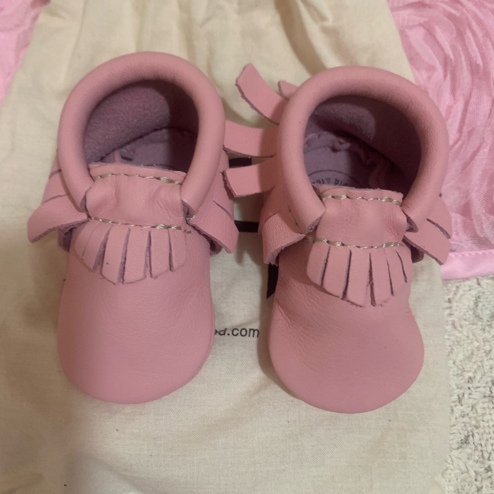 Freshly picked leather pink moccasins baby size o new in bag
